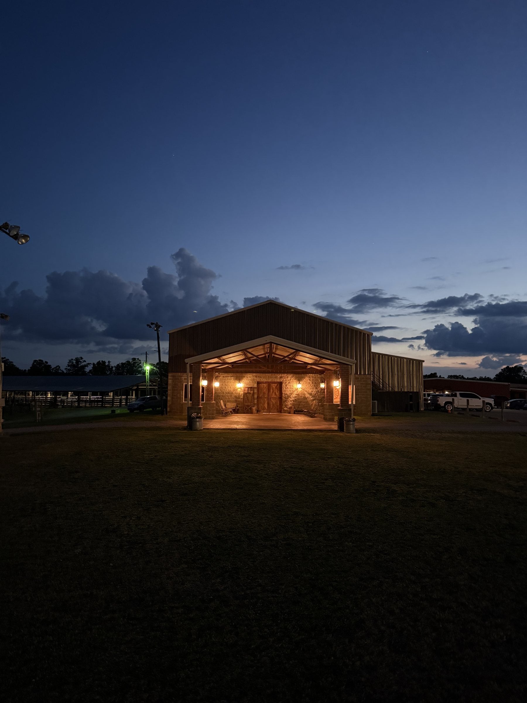 The Grand Hall at Lamb Ranch, lit at dusk